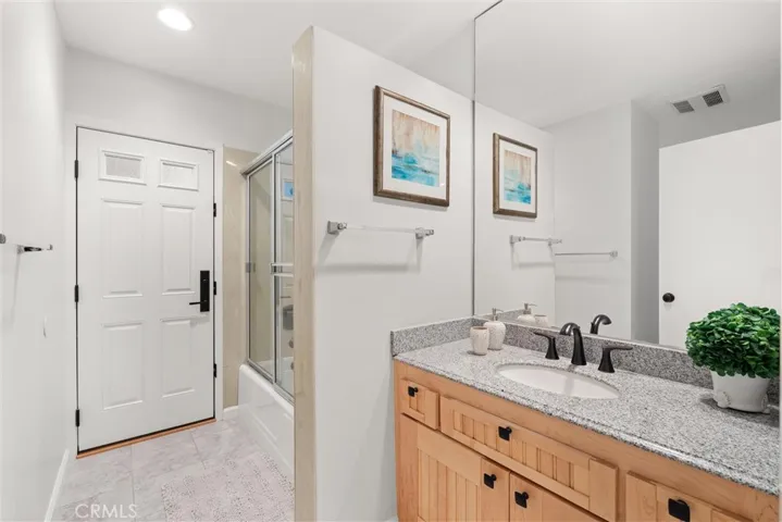 Bathroom #3 (next to Bedroom #4) access to outside garage area.