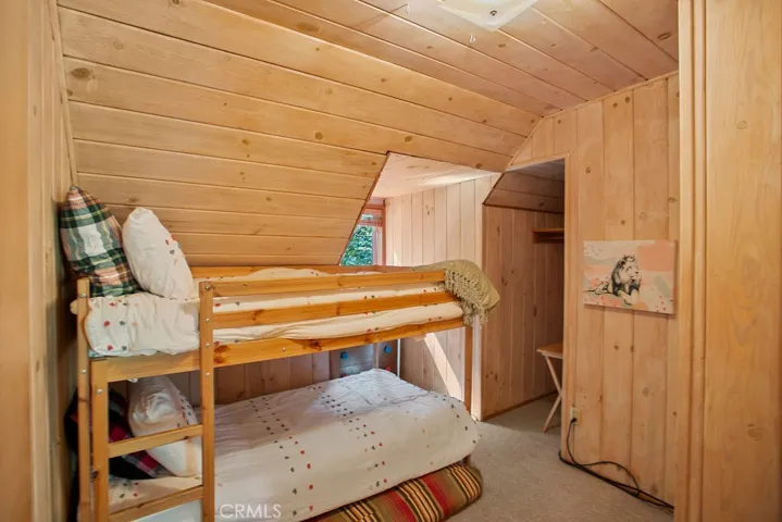 Upstairs 4th bedroom with bunk beds and closet