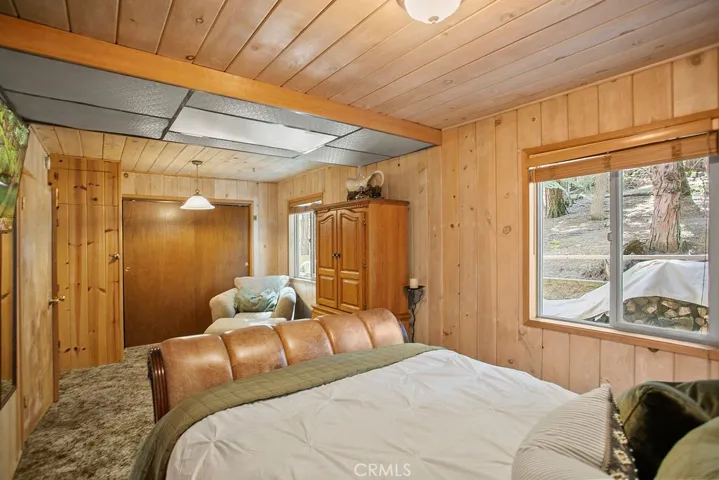 First level primary bedroom with closet and ample room for additional seating