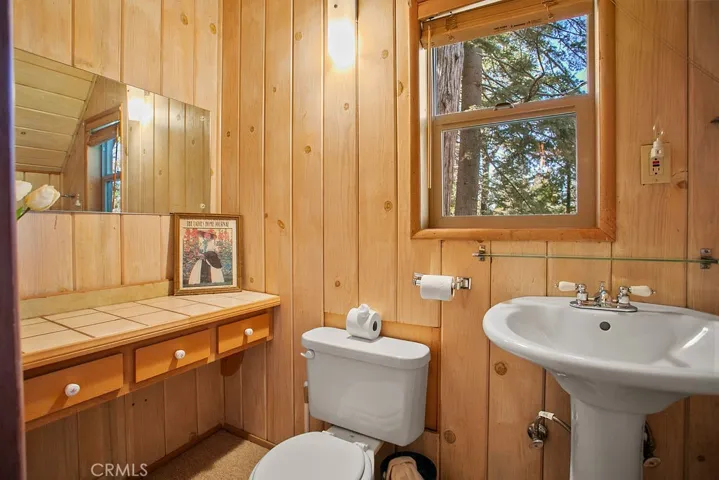 Upstairs half bathroom serving 2 bedrooms