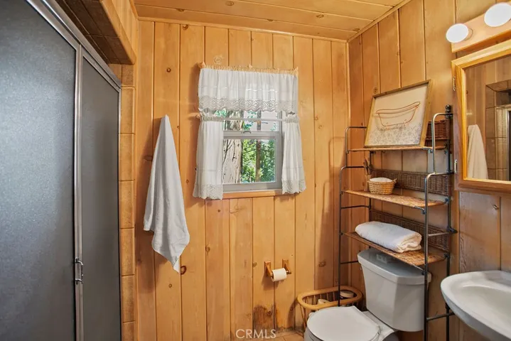 First level hall bathroom with spacious walk in shower