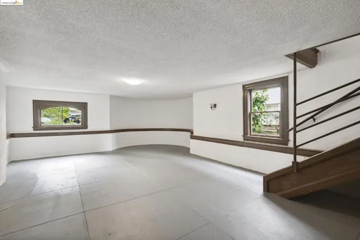 LOWER LEVEL RUMPUS ROOM OR...