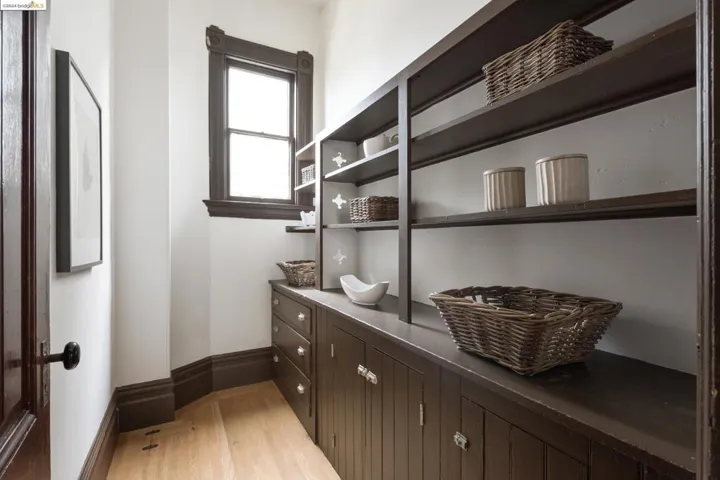 PANTRY THAT IS ADJACENT TO THE KITCHEN