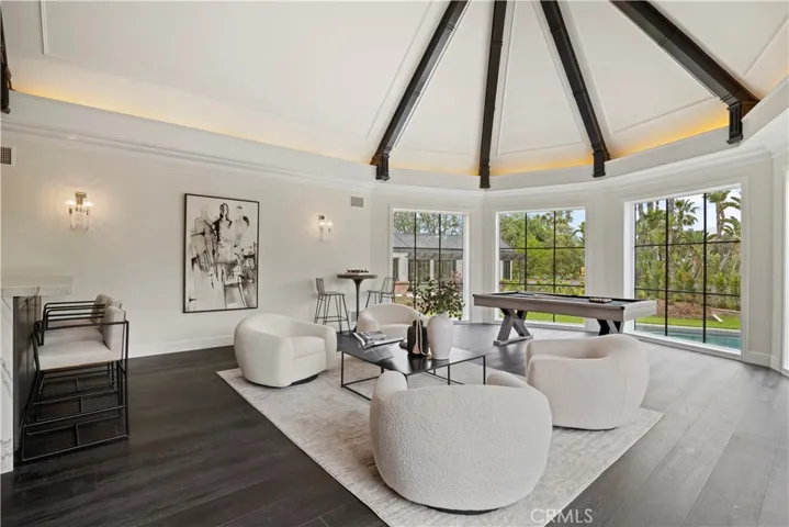 Grand room overlooking pool and courtyard