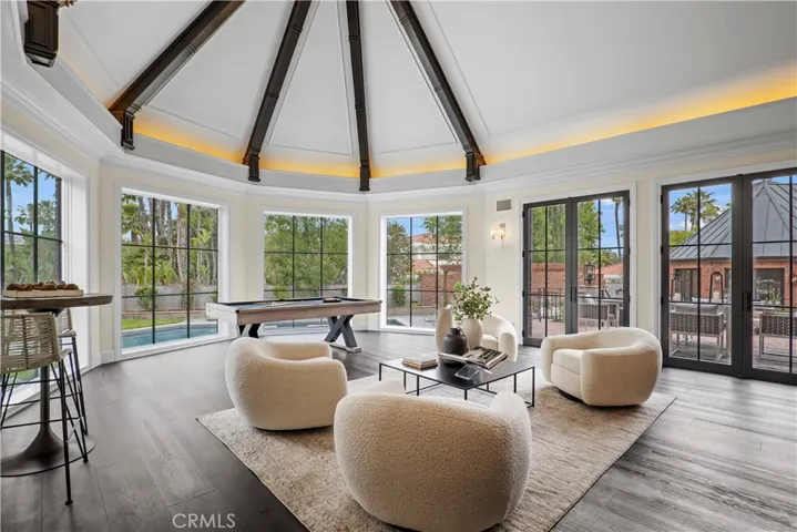 Grand room overlooking pool and courtyard