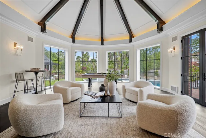 Grand room overlooking pool and courtyard