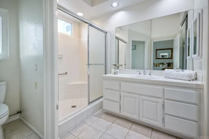 Features walk in shower and walk in closet