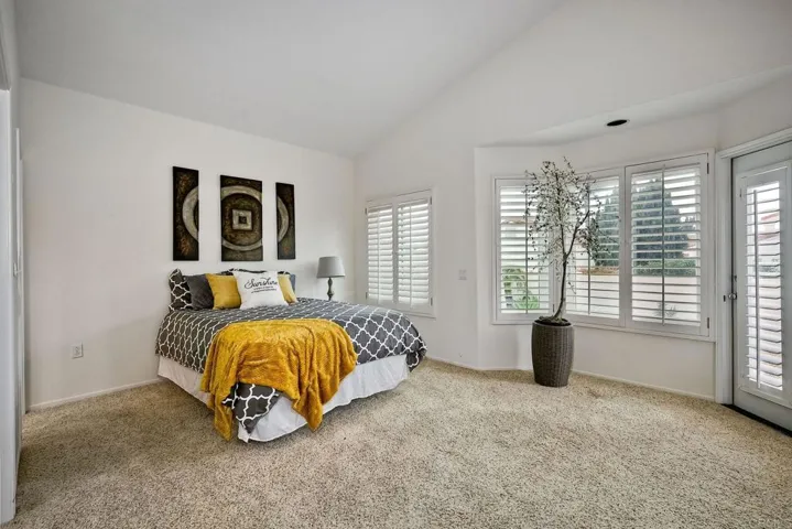 Bedroom with attached bath and walk in closet