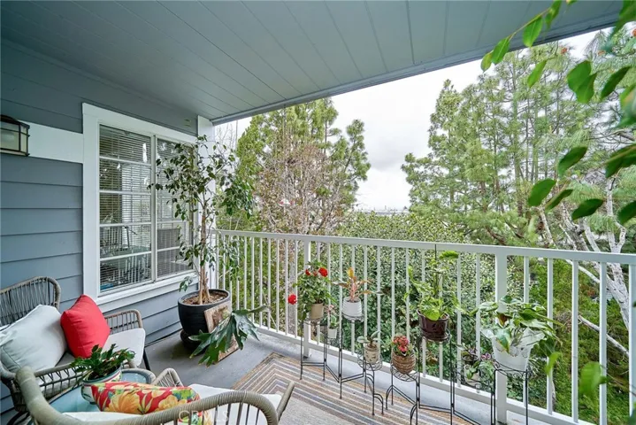 this large balcony just outside the living room, is perfect for growing your own little garden, relaxing and taking in the ocean and portside view.