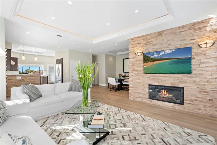Living Area with a Fireplace & Flat Screen TV