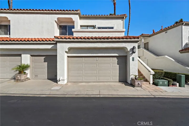 Front View of the Building and the 2 Car Garage