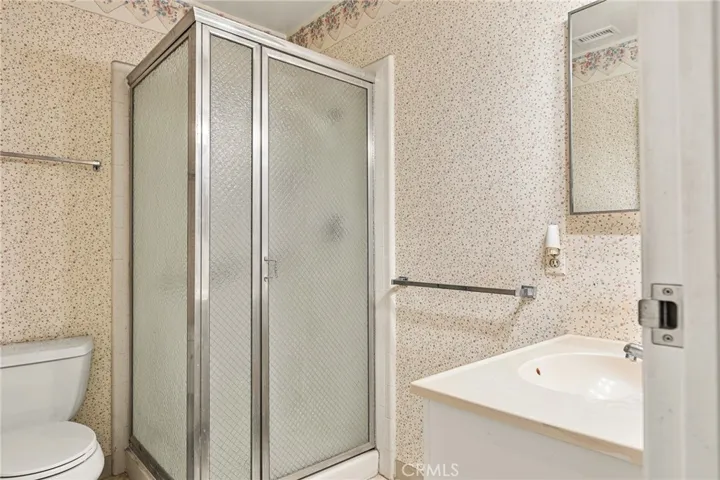 Primary bath with walk-in shower.