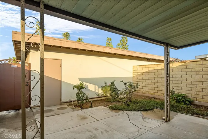 Secure entry from garage into back patio