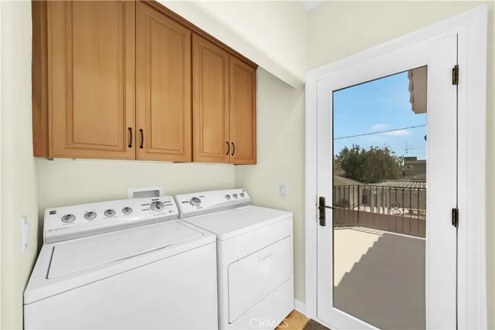 Inside laundry and door to roof-top deck