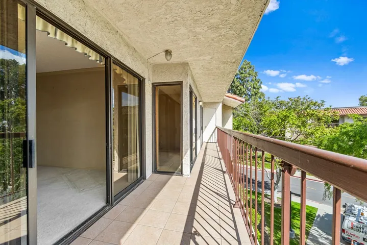 Balcony -legnth of entire unit. access by living room and both bedrooms