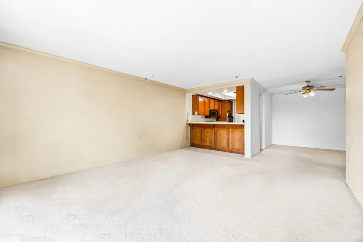 Living room looking towards kitchen and dinning room