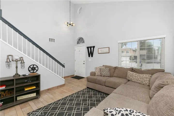 Additional view of the living room with views of the mountains.