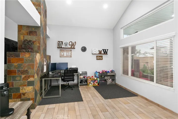 Double sided fireplace and large area for entertaining or relaxing.