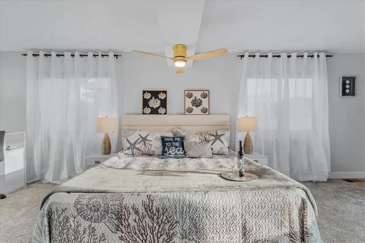 Primary suite upstairs with ocean views.