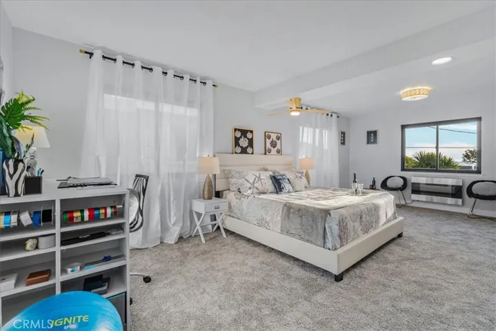 Primary suite has office and sitting areas.