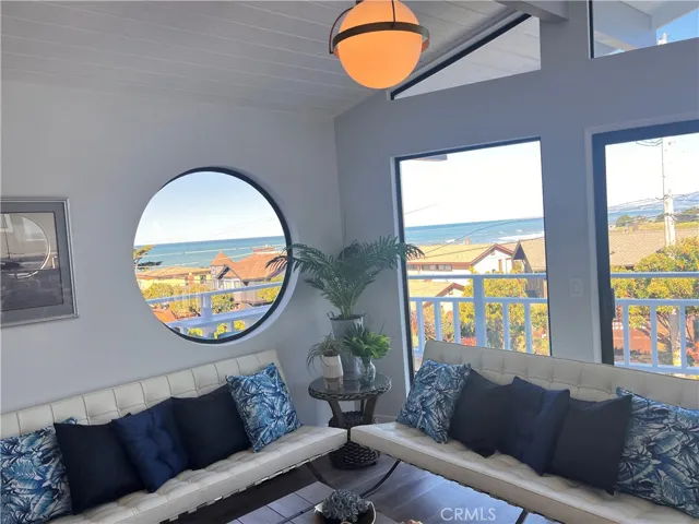 Gorgeous round window frames the sea.