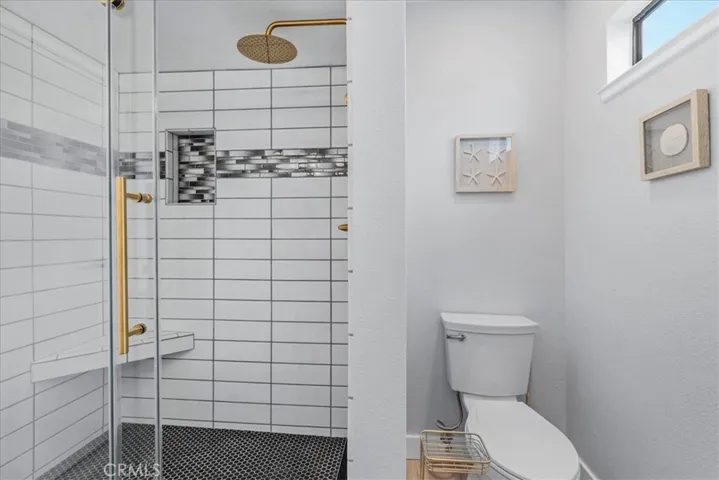 Double vanities and walk in shower.