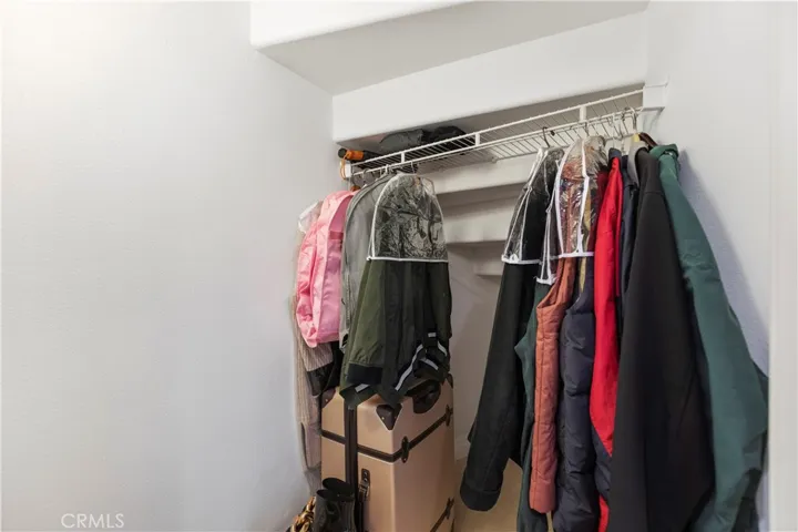Ample storage under the stairs.
