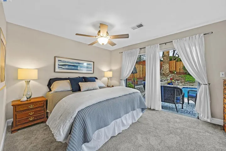 Primary Bedroom with view to the Pool
