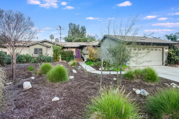 REMODELED, SOLAR PANELS THAT ARE OWNED (2020), POOL and on a HUGE 11,361 SQ. FT. corner lot! This beautiful entertainer’s pool home with abundant upgrades and amenities is nestled on a quiet street in one of West Hills most sought-after neighborhoods. The eco-friendly drought tolerant landscaping with its trees, flowering grasses, green foliage, lighted brick pedestrian pathway and covered front porch enhance its eye-catching curb appeal.