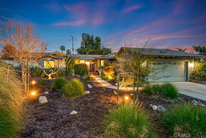 REMODELED, SOLAR PANELS THAT ARE OWNED (2020), POOL and on a HUGE 11,361 SQ. FT. corner lot! This beautiful entertainer’s pool home with abundant upgrades and amenities is nestled on a quiet street in one of West Hills most sought-after neighborhoods. The eco-friendly drought tolerant landscaping with its trees, flowering grasses, green foliage, lighted brick pedestrian pathway and covered front porch enhance its eye-catching curb appeal.