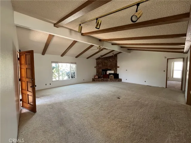 Huge LR with corner fireplace.
