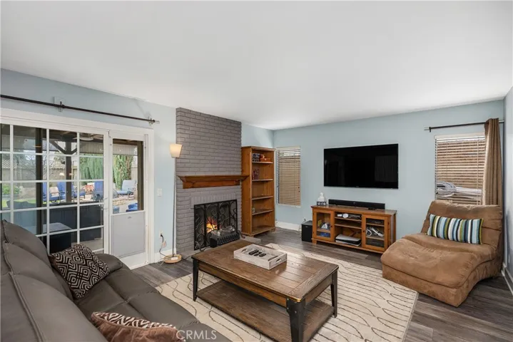 Family room with cozy fireplace.