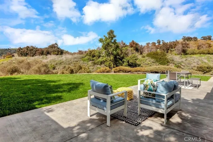 18,975 sq. ft. lot with gorgeous views of the surrounding hills ion three sides.