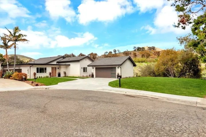 ALL NEW driveway, walkways & backyard concrete, auto sprinkler system front/rear/side, drainage system, sod, landscaping, side yard fencing & more.