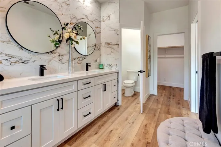 Remodeled/reconfigured Primary Bath w/separate water closet & HUGE walk-in closet