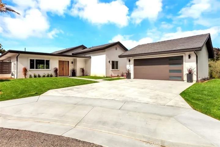 ALL NEW tile roof, stucco, stacked stone accent wall, insulation, double entry doors & ext. lights.