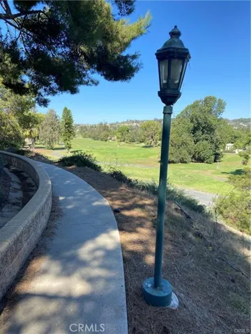 Mesa Vista's "Paseo" is a paved walking path that runs between the community and the golf course below.