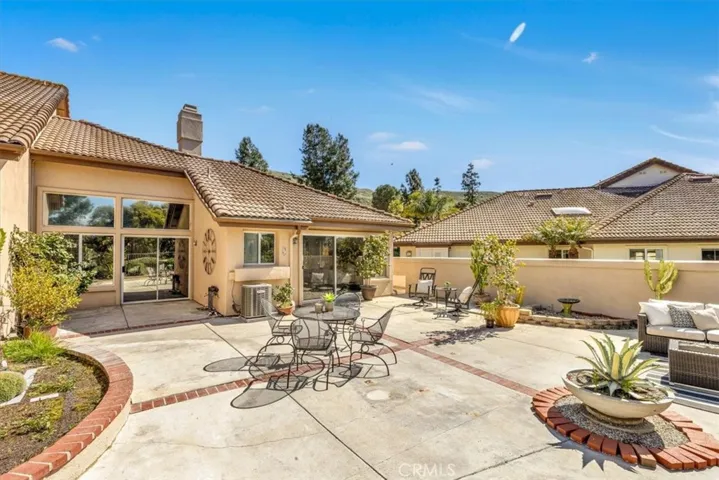 The oversize back patio provides plenty of space for seating & dining options.