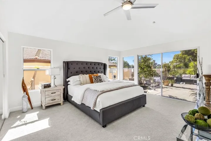 The master suite overlooks the back patio and offering private access is a relaxing place to begin & end each day!