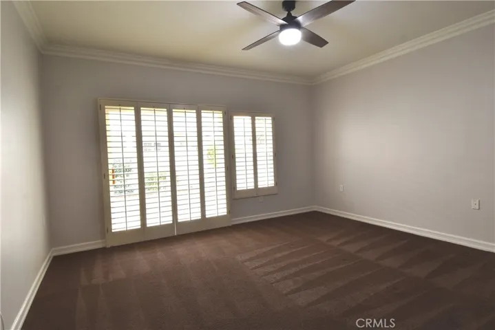 Master Bedroom w/ Plantation Shutters, Carpet, Ceiling Fan