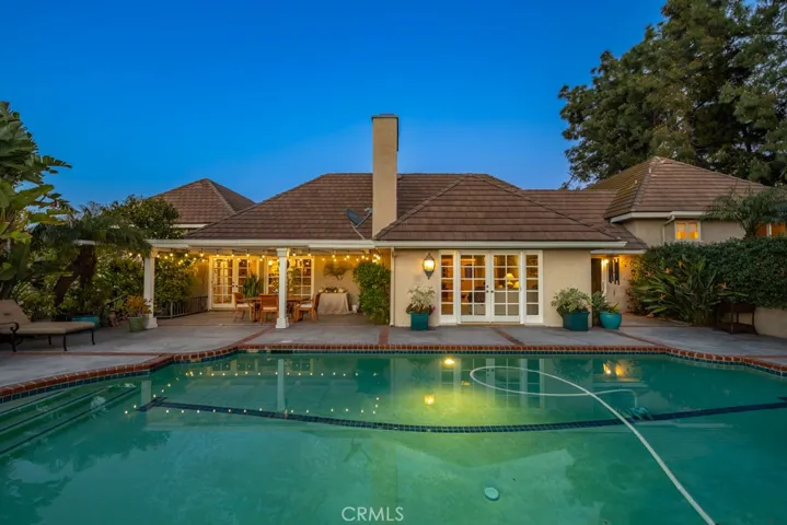 Pool and house at dusk