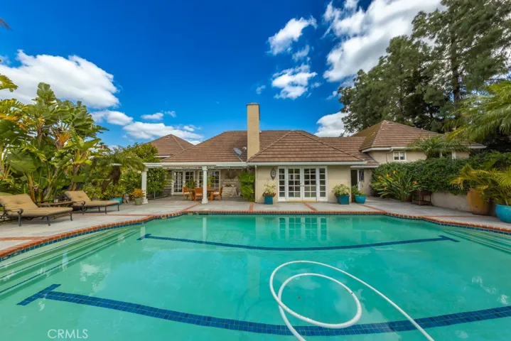 Pool looking toward house during the day