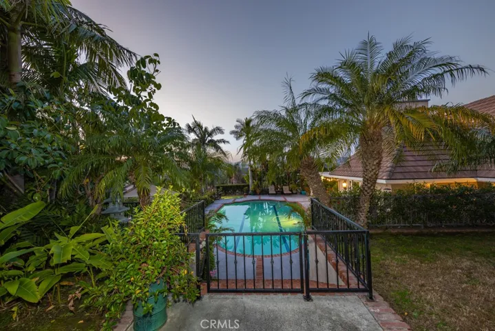 Top of stairs looking down toward pool