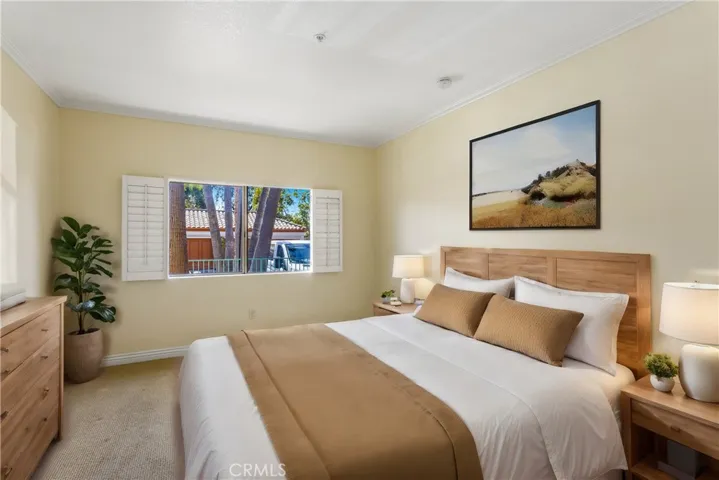 Virtual Staging of Front Primary Bedroom.