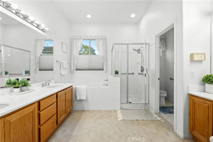 Wide angle of the primary bathroom.