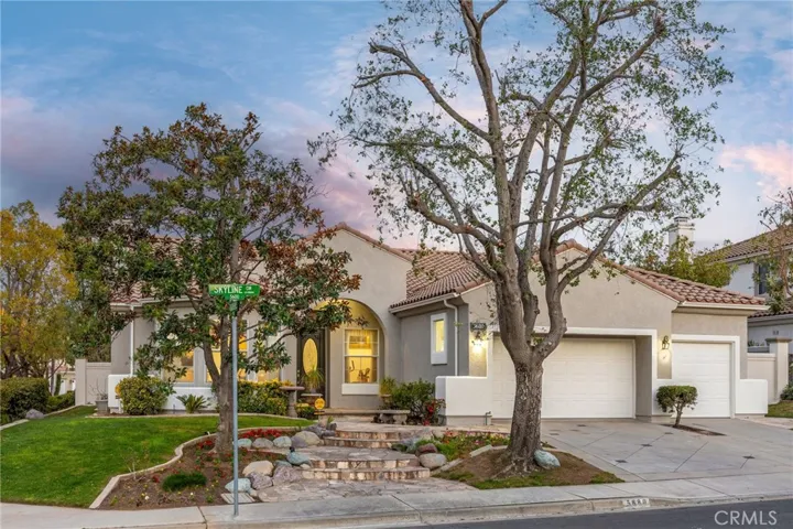 Single story home situated on a slightly elevated corner lot with brand new exterior paint.