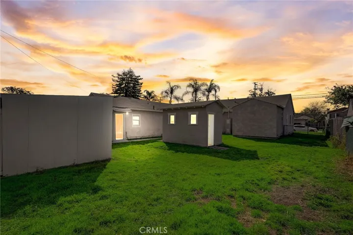 Large Yard with lots of Development Potential. Bonus Studio & Bathroom behind the garage as well as storage building in the yard