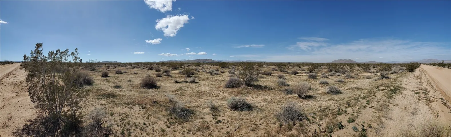 Panoramic view from the corner of Outpost and Neptune looking West