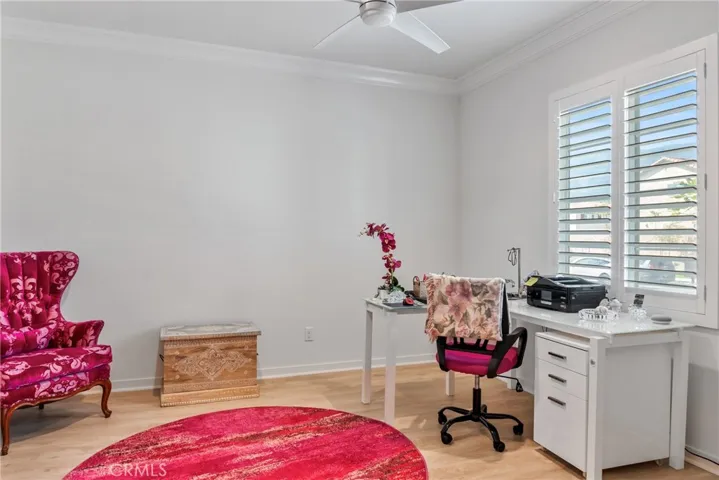 Office to the right of the entry, downstairs