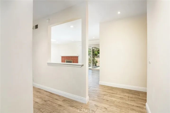 Bright entry to kitchen and living room